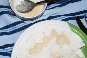 tapioca with coconut filling next to a bowl with the rest of the filling