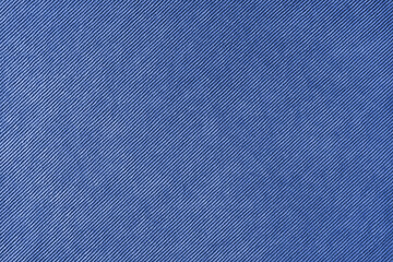 Texture background of velours blue fabric. Upholstery velveteen texture fabric, corduroy furniture...