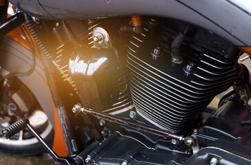 Shiny black motorcycle engine and gearbox block.
