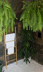 Bathroom with tropical leaves and ladder