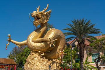 Fototapeta na wymiar Hai Leng Ong Statue Golden Dragon Monument in Phuket Town