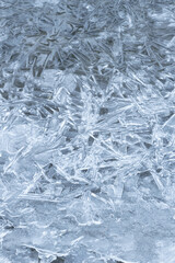 Abstract background of ice texture on a frozen river.