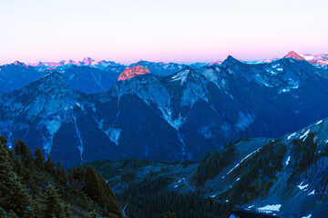 First light on north cascades mountain peaks