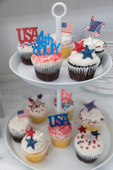 Close-up of Fourth of July themed cupcakes on display stand