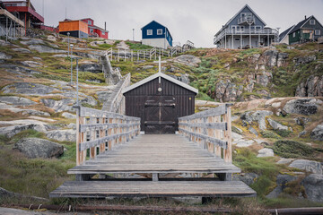 colored church and houses in ilulissat town