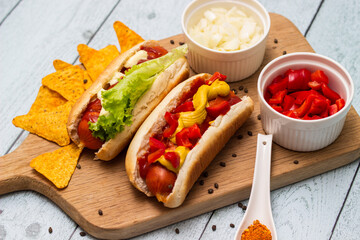 Homemade hot dogs with chilli pepper and other toppings