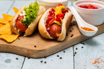 Homemade hot dogs with chilli pepper and other toppings