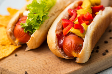 Homemade hot dogs with chilli pepper and other toppings