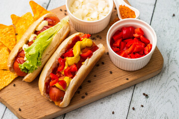 Homemade hot dogs with chilli pepper and other toppings