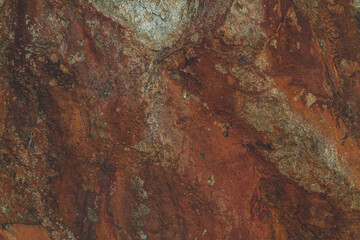 Hard rock wall textured background that has a vintage rusty old grunge effect perfect for an abstract use in the back of other image elements.