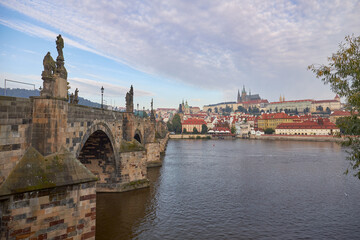 Fototapeta na wymiar Close-up of the Charles Bridge in Prague and the cathedral in the background.