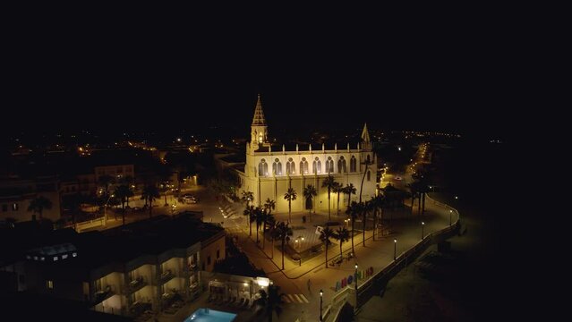 Sky view of Chipiona flying a drone, in the province of Cadiz at night (Andalucia, Spain). View of the Shrine of Our Lady of Regla