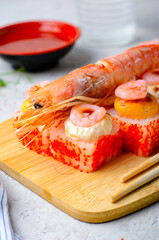 Sushi Rolls with Langoustine and Shrimps, Baked Sushi Rolls Seafood and Crab, Cream Cheese Topped