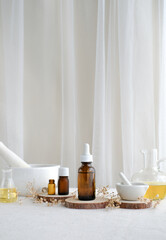 vertical picture of beauty and spa products or natural skincare on luxury fabric background.