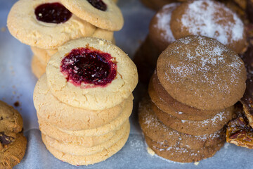 Stacks of scrumptious home-baked cookies and biscuits for sale at local country food market