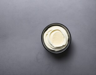 bowl of tasty mayonnaise on wooden background