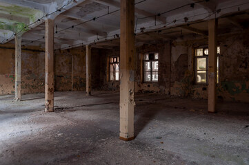 Old abandoned haunted red brick factory of stockings, pantyhose and socks in Central Europe, Poland