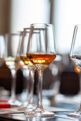 Glass with whiskey, tasting of whisky at the restoraunt