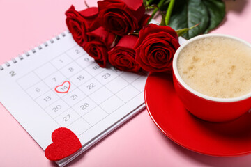 Calendar with marked date of Valentine's Day, roses and cup of latte on pink background