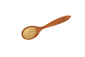 Fenugreek flour, coarsely ground. Hulbah powder in wooden spoon. Herbal nutritional supplement. Fenugreek soothe upset stomach and digestive problems