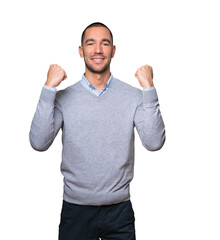 Naklejka premium Happy young man doing a competitive gesture