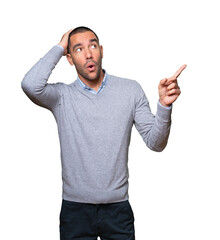 Cool young man pointing with his finger