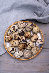 Fresh small spotted partridge or quail bird eggs