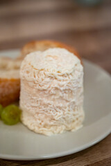 Cheese collection, French soft Chabichou of Poitou cheese made from goat milk in region Nouvelle-Aquitaine, France
