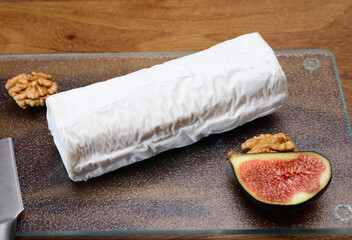 French organic matured white goat cheese with white rind close up