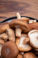 Fresh brown Lentinula edodes or shiitake edible mushrooms