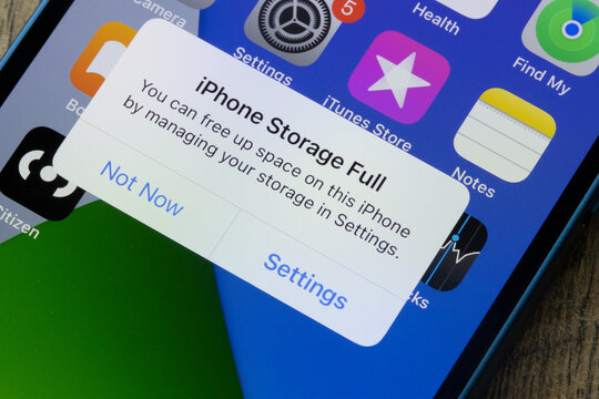 Portland, OR, USA - Jan 2, 2023: Notification of "iPhone Storage Full" is seen on an iPhone.