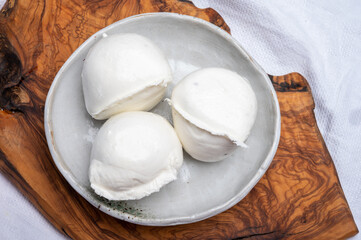 White ball of Italian soft cheese Mozzarella di Bufala Campana
