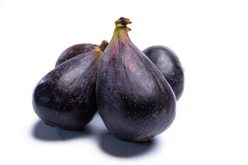 Fresh ripe organic figs fruits ready to eat close up isolated on white background