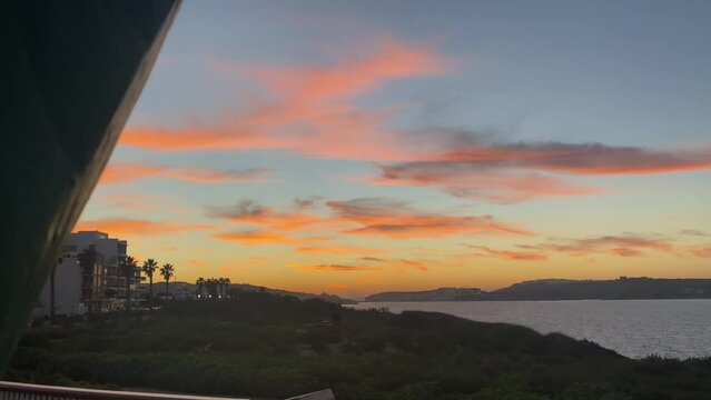 Winter in Malta. Sunset on the Bugibba coast, st Pauls Bay. Mediterranean sea. High quality 4k footage