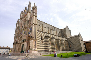 Lateral view of the monumental Cathedral of Orvieto, Umbria region, Italy