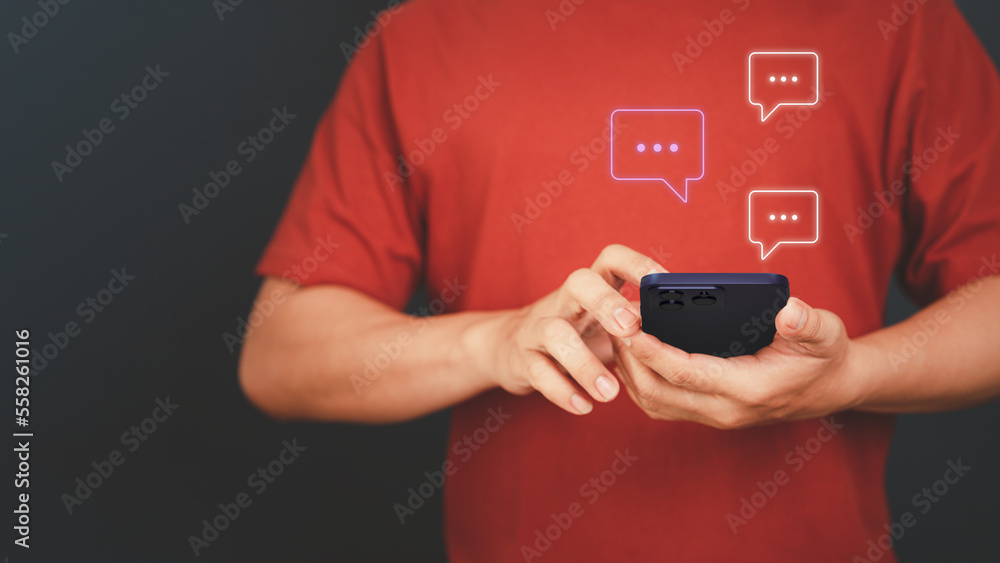 Aufkleber Man hand using smartphone typing live chat chatting on application communication digital web and social network concept. Social media application chat box.