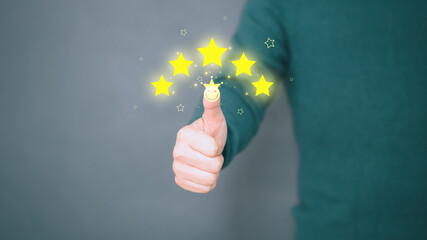 Man give positive reviews for customer satisfaction surveys, Five star rating, Customer assessment feedback, Service rating satisfaction and testimonial concept.