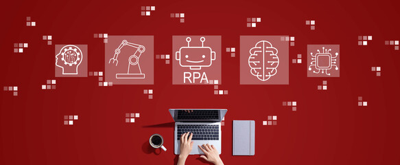 Robotic Process Automation RPA theme with person working with a laptop