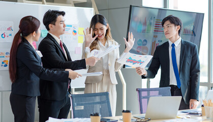 Millennial Asian young stressed upset businesswoman employee in formal suit denying graph chart...