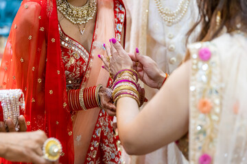 Indian Hindu wedding bride and groom's hands close up