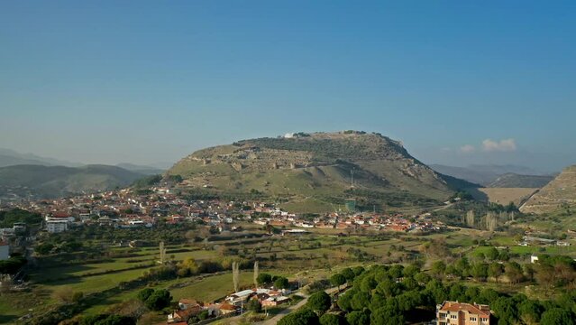 general view of the houses at the foot of the mountain taken with a drone