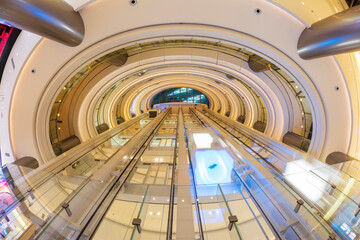 Obraz premium Escalator in the building of the business center, Straight stairs in the mall