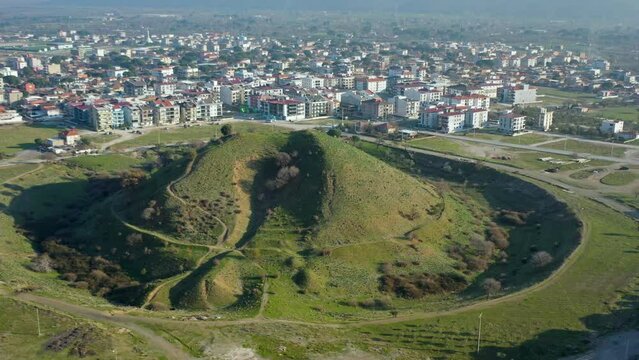 Drone image of the tumulus and the houses surrounding it