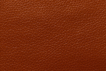 Brown leather and a textured background.