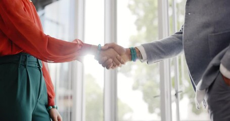 Closeup, handshake and businessman with woman, welcome or respect at meeting, workplace or interview. Business people, greeting and shaking hands in agreement, contract or thank you at finance agency
