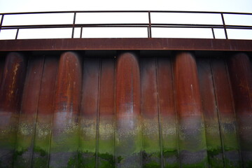 rusted marina barrier with catwalk