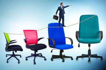 Promotion concept with businessman and chairs