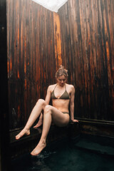Woman relax in warm springs water