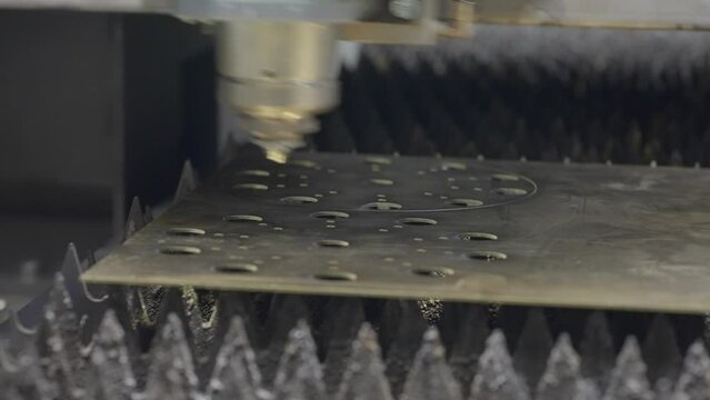 Laser cutting a sheet of brass