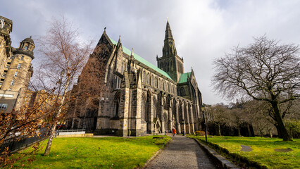 Glasglow Cathedral , The oldest cathedral church in mainland Scotland with classic gothic architecture during winter sunny day at Glasgow , Scotland : 27 February 2018